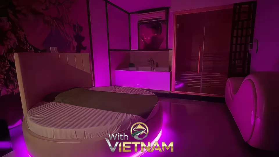 보라색 조명의 모던한 원형 침대 룸