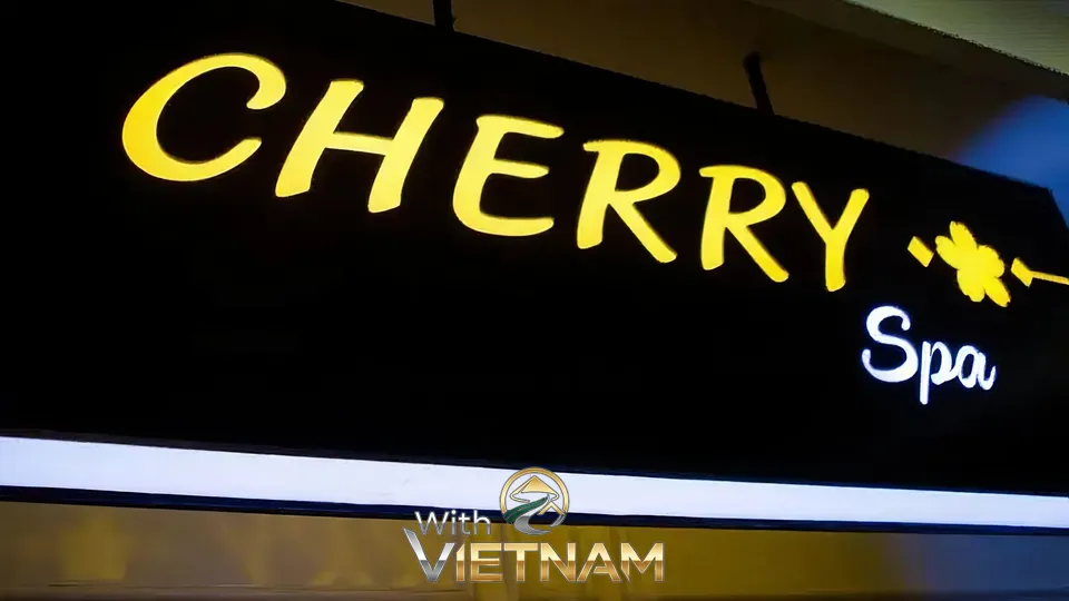 체리 스파의 노란색 조명 간판