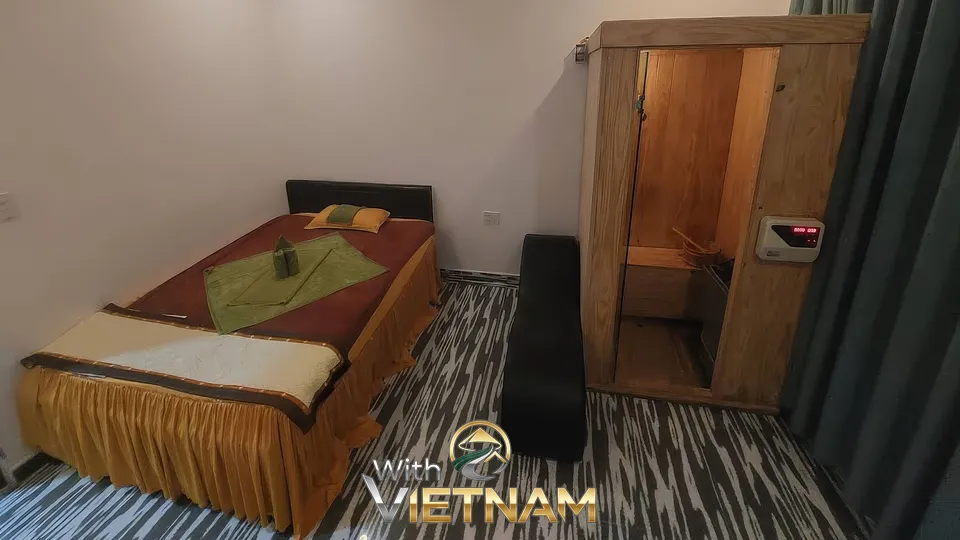 단일 침대와 사우나가 있는 마사지실